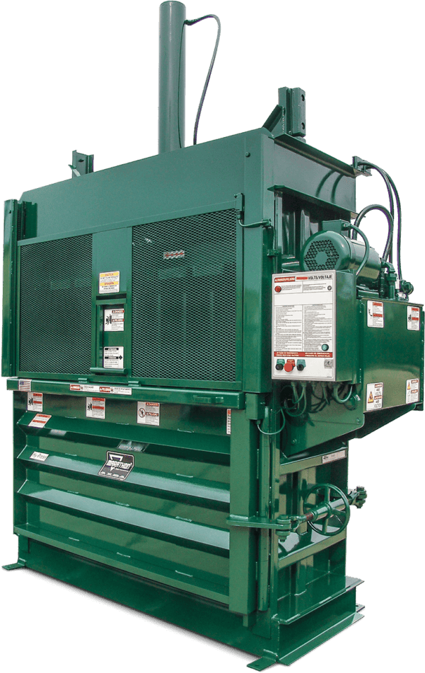A large green industrial baler machine with control panel, warning labels, and hydraulic components, used for compressing materials such as cardboard or recyclables.